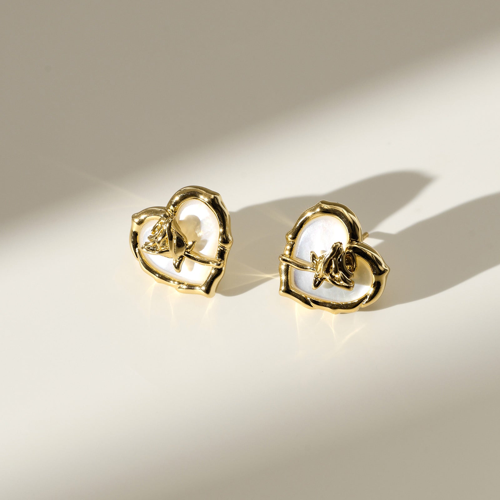 Gold-Tone Mother of Pearl Heart Stud Earrings