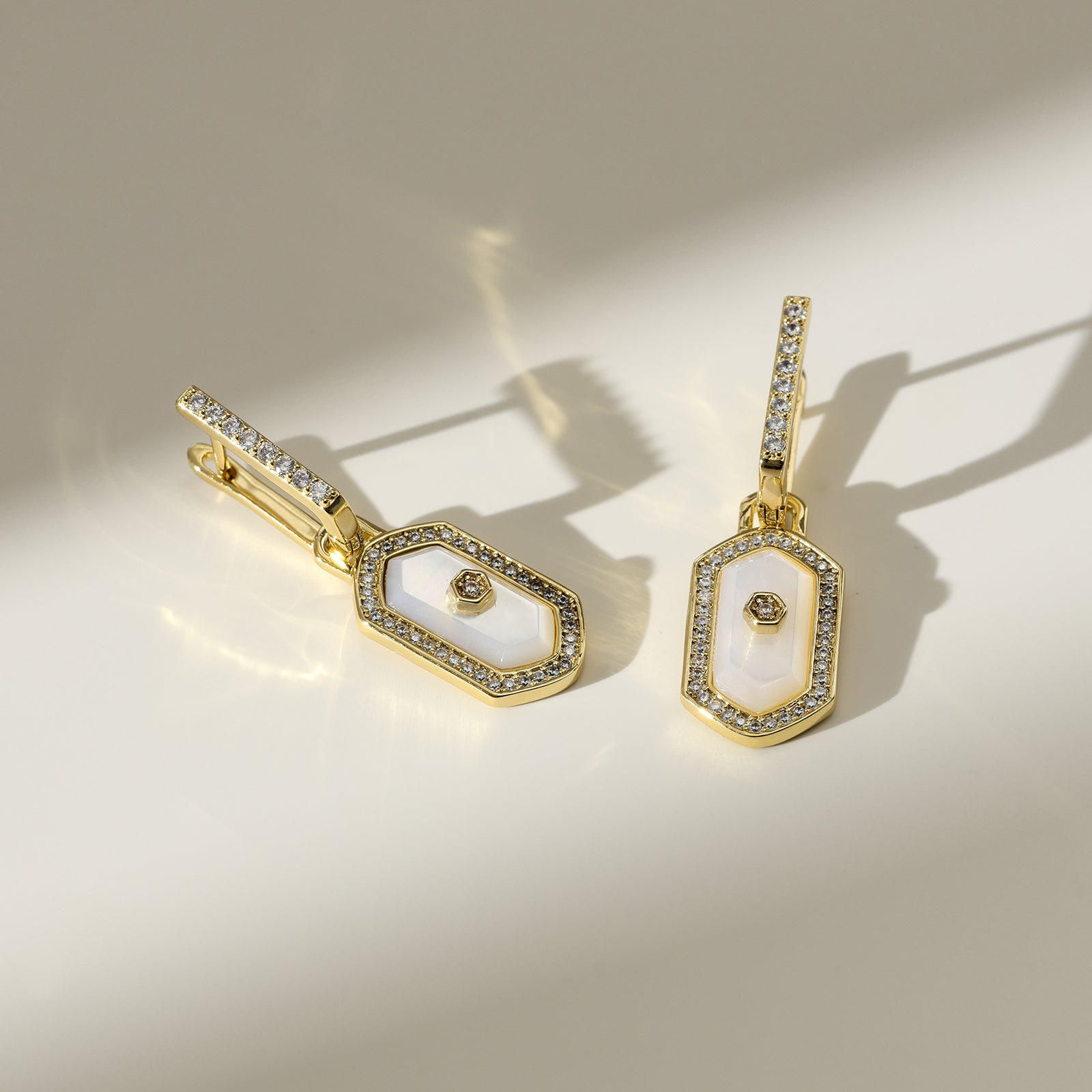 Innocence Age Statement Shield Huggie Earrings