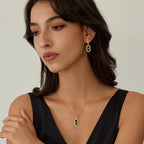 Innocence Age Statement Shield Huggie Earrings