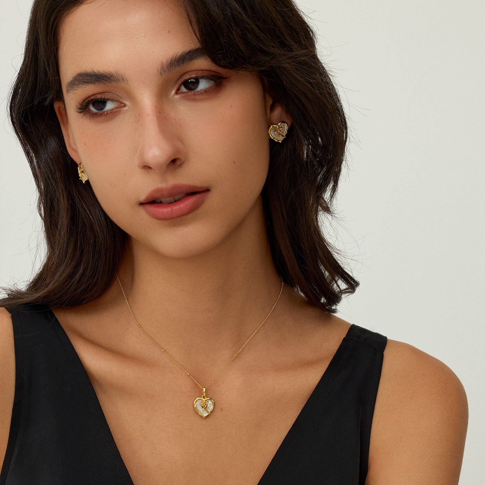 Gold-Tone Mother of Pearl Heart Stud Earrings