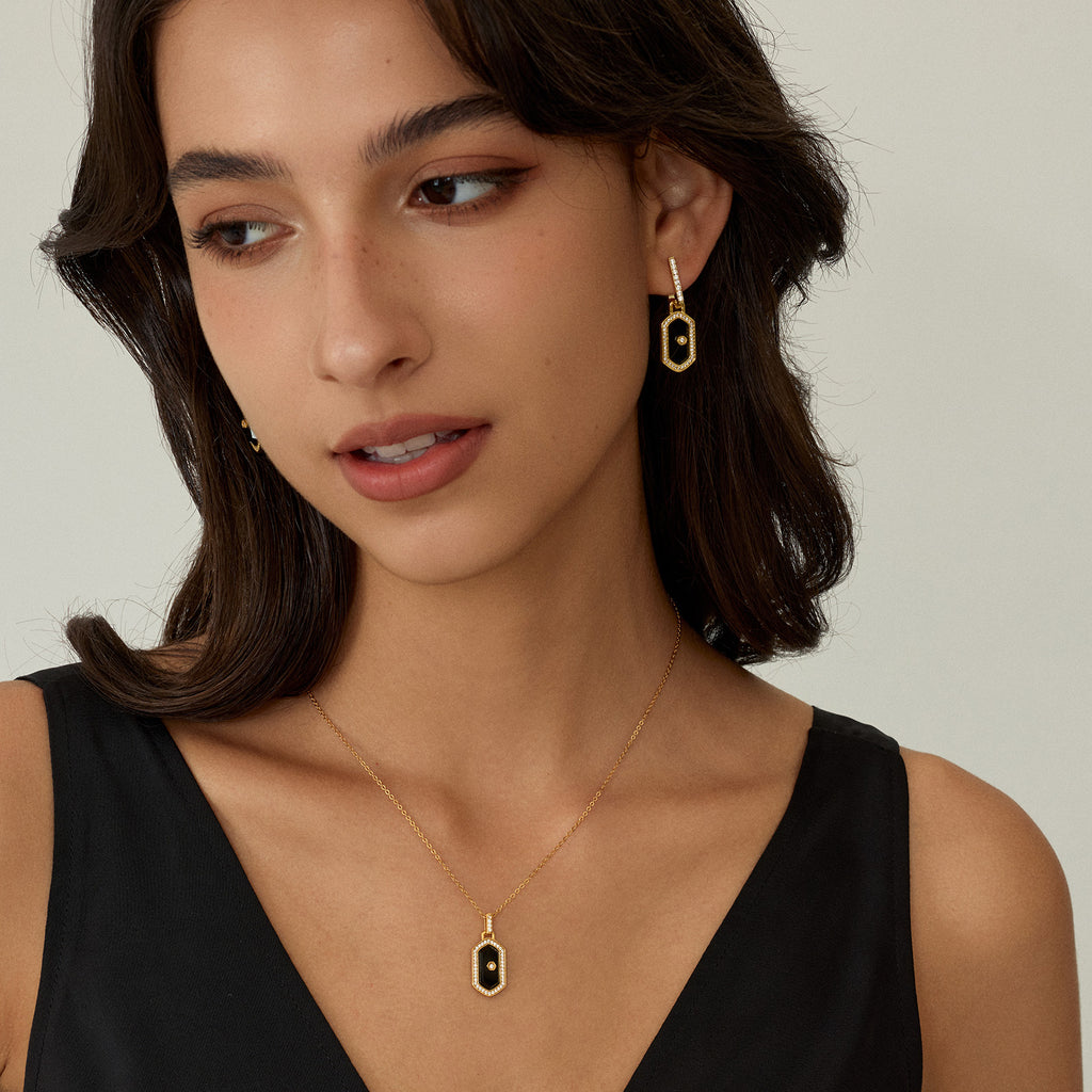 Innocence Age Statement Shield Huggie Earrings